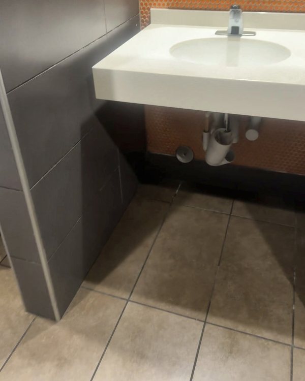 Clean restroom sink and counter